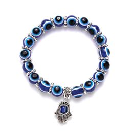 glass beads charm bracelet Canada - Blue Eye Beads Bracelet Classic Round Glass Bead Elastic Rope Charm Bracelets Fashion Men Women Elephant Owl Butterfly 5941 Q2