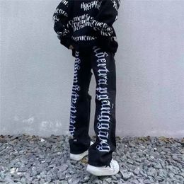 European and American high street letters embroidery oversized jeans on the back of men's loose straight-leg ripped trousers 220606
