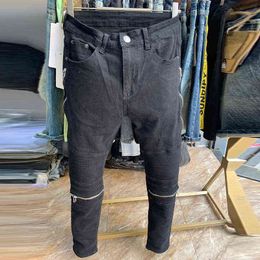 Moda de primavera Jeans Slim Slim Ins Corea Negro Pantalones de piernas rectas Molcones Rasgados Pantalones de motocicleta Jeans Homme Marque de Luxe G0104