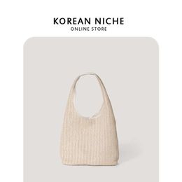 2022 summer new large capacity grass woven bag women's fashion simple ins niche design shoulder