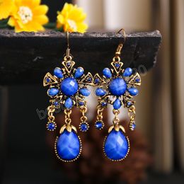 Women's Flower Carved Hollow Dangle Earrings Hangers 2022 Bollywood Jhumka Red Stone Bead Alloy Earings Ethnic Indian Jewellery