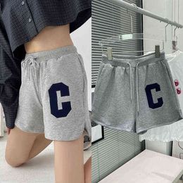 spring and summer age reduction sticker embroidery drawstring elastic waist hot pants slim sports casual shorts women