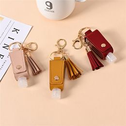Keychains 10pcs 30ml Portable Empty Leakproof Plastic Travel Bottle For Hand Sanitizer With Tassels Leather Keychain Holder Carriers