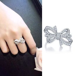 silver crystal rings NZ - fashion shining crystal sweet bowknot band rings for women open ajustable silver cz zircon bow designer ring wedding jewelry