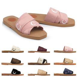 Pantofole estive in gomma da donna Designer Canvas Cross Plat Woody Casual Slide rosa Sandali peep toe da esterno con lettera stilista