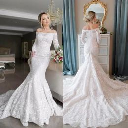 Vintage 2022 Mermaid Wedding Dresses Off The Shoulder Lace Appliques Long Sleeve Wedding Gowns Sweep Length Lace Up Bridal Dress