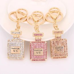 Fashion Rhinestone Crystal Perfume Bottle Shape Pendant Keychain Gifts Car Handbag Key Holder Party Gifts 3 Colours
