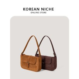 Bag female 2021 autumn and winter new niche design suede shaped single shoulder armpit Fashion stick bag