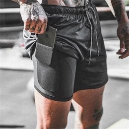 Double layer Jogger Shorts Men 2 in 1 Short Pants Gyms Fitness Built-in pocket Bermuda Quick Dry Beach Male Sweatpants 220318
