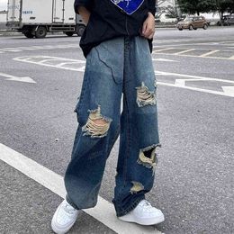 Корейская версия INS Hip-Hop High Street Hipsters огорченные старые разорванные джинсы Мужчины. Случайные брюки с широкими ногами G0104 G0104