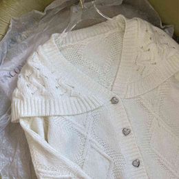 autumn and winter design sense sweater coat white temperament celebrity fan loose knit cardigan women