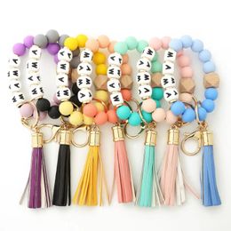 Foreign trade food grade silicone letter beads bracelet key chain alloy cap PU leather tassel pendant key ring female multi-color optional