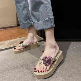 Pantofole da donna estive 2022 Nuova corda di canapa Sandali moda Fiore Infradito Spiaggia Casual Pantofole col tacco alto Pantofola Donna Y220412