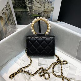 Borse firmate Pochette con manico in perla nera Mini borsa a tracolla monospalla portatile color nero e oro