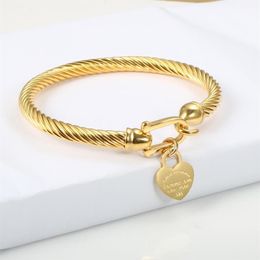 gold cable bracelet Canada - Titanium Steel Bangle Cable Wire Gold Color Love Heart Charm Bangle Bracelet With Hook Closure For Women Men Wedding Jewelry Gifts2381