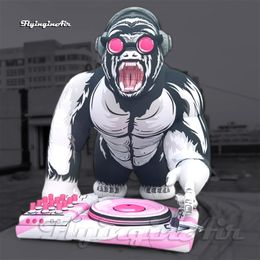 Customized Giant Inflatable DJ Gorilla Cartoon Animal Mascot Air Blow Up Orangutan With Headphone For Club And Bar Party Decoration