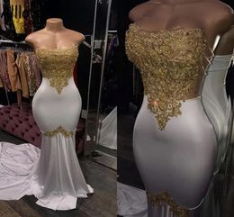 Stunning Gold Lace Appliques Beaded Evening Dresses Mermaid Strapless Arabic Aso Ebi Formal Party Gowns Sweep Train Sexy Special Occasion Prom Dress CL0611