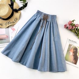 PEONFLY Autumn Winter Fashion Women Skirt Solid Color Laceup High Waist Denim Skirt Retro Pleated Midi Denim Flared Skirts 210306