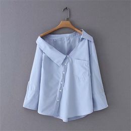 est women stylish solid blue irregular skew collar blouse long sleeve buttons decorate shirts elegant female tops 210401