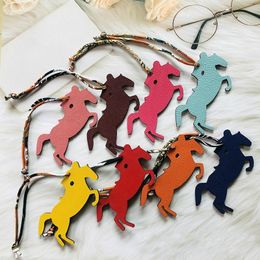 Real leather accessories classic sheepskin car key pendant women charm bag holder trinket animal horse with silk chain keychains