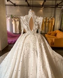 Luxury Ball Gown Wedding Dresses V Neck Long Sleeves Sequins Appliques Pearls Lace Ruffles 3D Lace Floor Length Luxury Bridal Gowns Plus Size robes de soiree