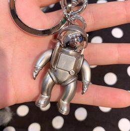 acrylic star beads Canada - Keychains Louiseity 3D stereo astronaut Viutonity space robot letters fashion metal key chain pendant accessories original packaging