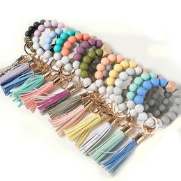 Top Quality Silicone Wood Leather Tassel Keychain Beaded Wrist Strap Bracelet Key rings for Women Ladies Wholesale Price