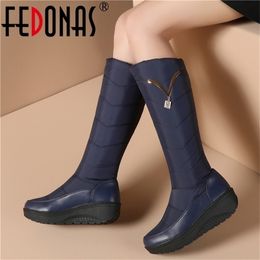 FEDONAS Classic Down Female Big Size Wedges Snow Winter Warm Metal Women Knee High Casual Shoes Woman Long Boots Y200915