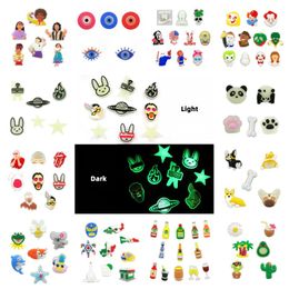 20pcs/set various Glow in the dark cartoon croc JIBZ Evil eyes karol G Luminous clog shoe charms buckles decorations 2D PVC Fluorescent Shoe accessories fit sandals