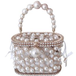 Evening Bags Women Pearl Handbags Ladies Luxury Designer Bucket Brand Bird Cage Buns For Female Diamond Hollow Out Bag 2022 High QualityEven