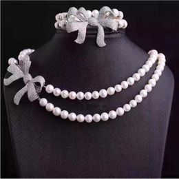 Hand knotted 8-9mm white freshwater pearl necklace 17-18inch bracelet 8inch zircon micro inlay bowknot set fashion jewelry