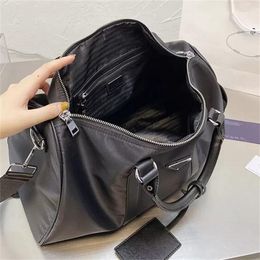 Fashion brand Black Nylon Duffle Bag 42cm Designers Luggage Bags Men Women Shoulder Travel Sports Ba g Large Capacity Waterproof Duffel Bag Handbag