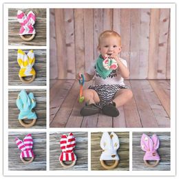 fabric teether Canada - Vieeoease Baby Teething Ring Fabric and Wooden Teething Training with Crinkle Material Inside Sensory Toy Natural teether Bell EC-2979