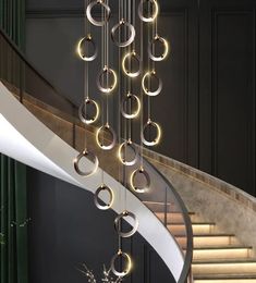 Stair lamp long Pendant Lamps duplex building modern minimalist light luxury creative villa loft living room ring chandelier