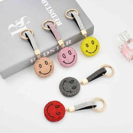 Keychains Korean version of the cute smiling face exquisite micro inlaid with diamond bag car Pendant Gift