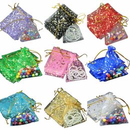 Bolsas de joyas bolsas 100pcs estrellas lunar shrawstring organza pequeña regalo para fiesta de bodas de San Valentín Jewelry