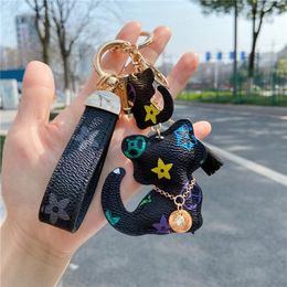 Creative old flower keychains fashion leather animal key chain men and women's holiday gifts hand rope car bag pendant small gifts