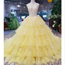 2022 Yellow Beaded Ball Gown Prom Dresses Sleeveless Sheer Neck Illusion Formal Arabic Evening Gowns