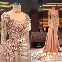 Nude Pink Mermaid Prom Dresses Sexy V Neck Long Sleevels Satin Appliques Sequins Ruffles Plus Size Luxury Crystal Prom Gowns Floor Length Custom Made Evening Gown