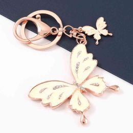 Pauli Manfi 2021 Fashion Metal Dripping Oil Rhinestone Butterfly Keychain Car Key Ring Backpack Pendant Campus Accessories AA220318