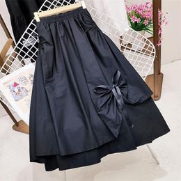 Spring and Summer Slim Skirt Female Fake Pocket Design Irregular Large Swing Mid-length A-line 220322