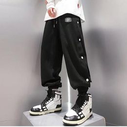 Мужские штаны Японская мода Мужчина Хип -хоп Тонкий весенний летний кнопка Обе брюки Уникальный дизайн -подросток свободный брюк