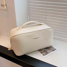 Cosmetic Bag Women's Portable Large Capacity Ins Wind Super Fire Multifunctional Waterproof Hand Wash Bag Cosmetic Storage Bag 220625