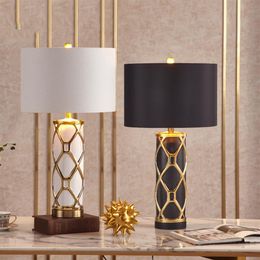 white cross decoration NZ - Fashion Crossed Gold Plated Stripes Ceramic Table Lamp Black White Bedroom Living Room el Table Lights Office Decoration Lamp264o
