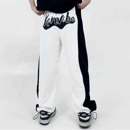 Pantaloni casual con ricamo lettera patchwork bianco nero Pantaloni sportivi larghi oversize da uomo e da donna T220803