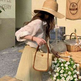 Bags Heat leather portable bucket bag grid straw woven version Single Shoulder Messenger hollow women's Bucket Bag