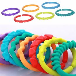 24pcslot Baby Teether Toys Colorful Rainbow Rings Baby Rattle Mobiles Crib Bed Stroller Hanging Decoration Educational Toys 220531