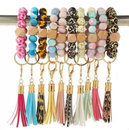 NEW Silicone Beads Keychain Tassel Bracelet Favour Wood Beaded Key Ring Handbag Charms Women Jewellery Wristring Gift