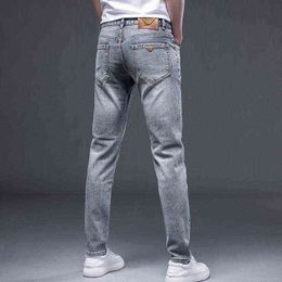 Men's Jeans Spring / Summer Thin Slim Fit Small Feet Elastic Casual Korean Version High-end Brand Mix and Match a