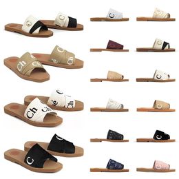 slider boxes UK - Women Flats Sandals Woody Mules Designer Canvas Slippers Rubber Sole Slides White Black Pink Khaki Beige Lace Lettering Fabrice Womens Summer Outdoor Shoes With Box